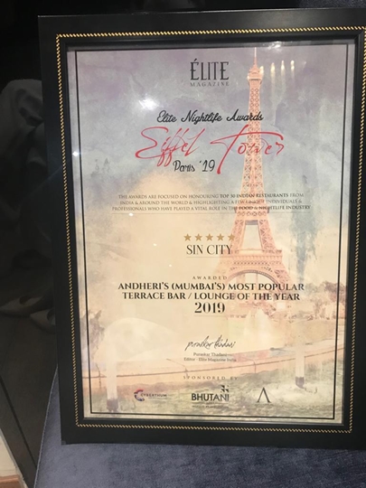 SIN CITY ROOFTOP RESTO & LOUNGE  WINNER OF  ANDHERI’S – MUMBAI’S MOST POPULAR TERRACE BAR- LOUNGE OF THE YEAR 2019 AT ELITE MAGAZINE – ELITE NIGHTLIFE AWARD – EIFFEL TOWER PARIS 2019